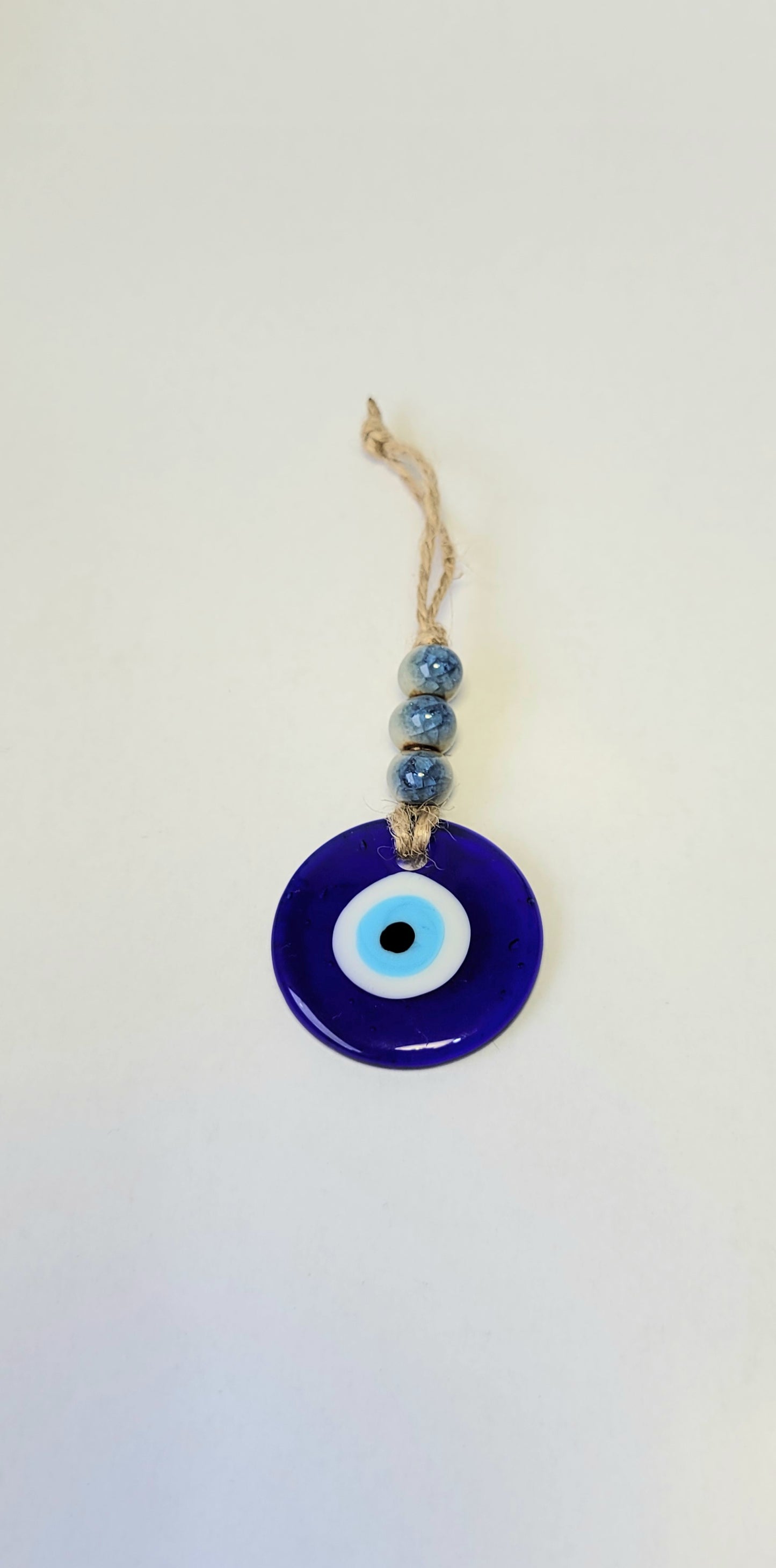 Evil eye charm wall hanging