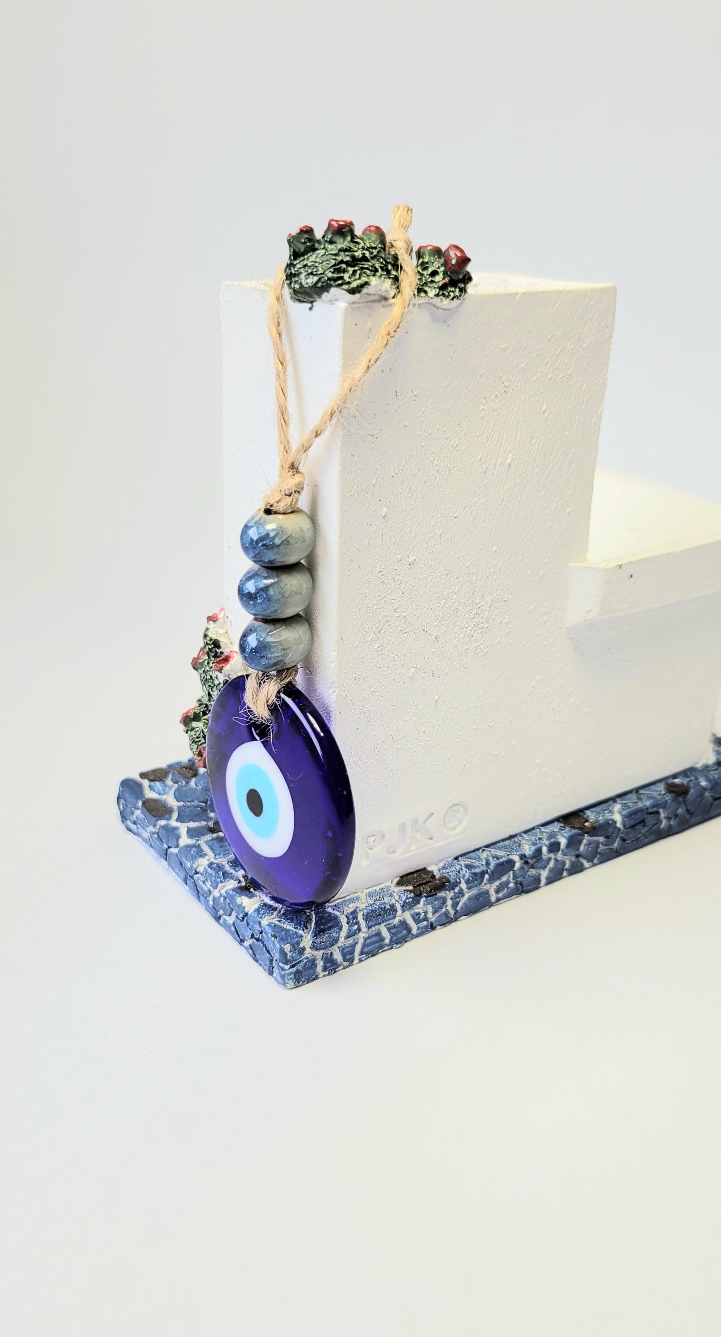 Evil eye charm wall hanging